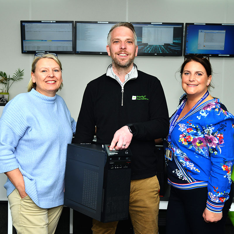 Babs Harris (left) and Rachel Fear of Alzheimer’s Support, with Priority IT Managing Director Kieran Thomas